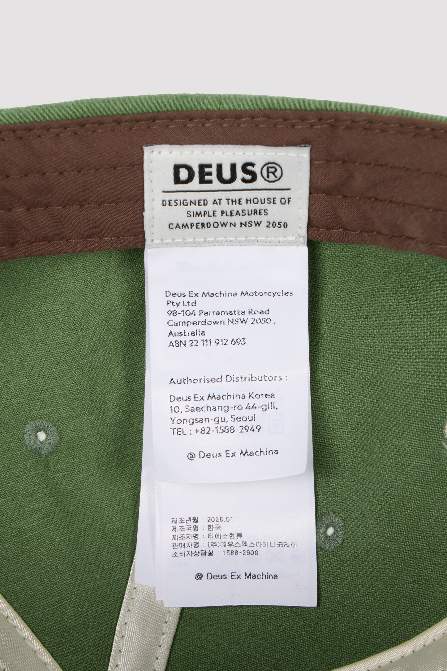 Deus Gorra marrón con la dirección de la dirección de Seul verde